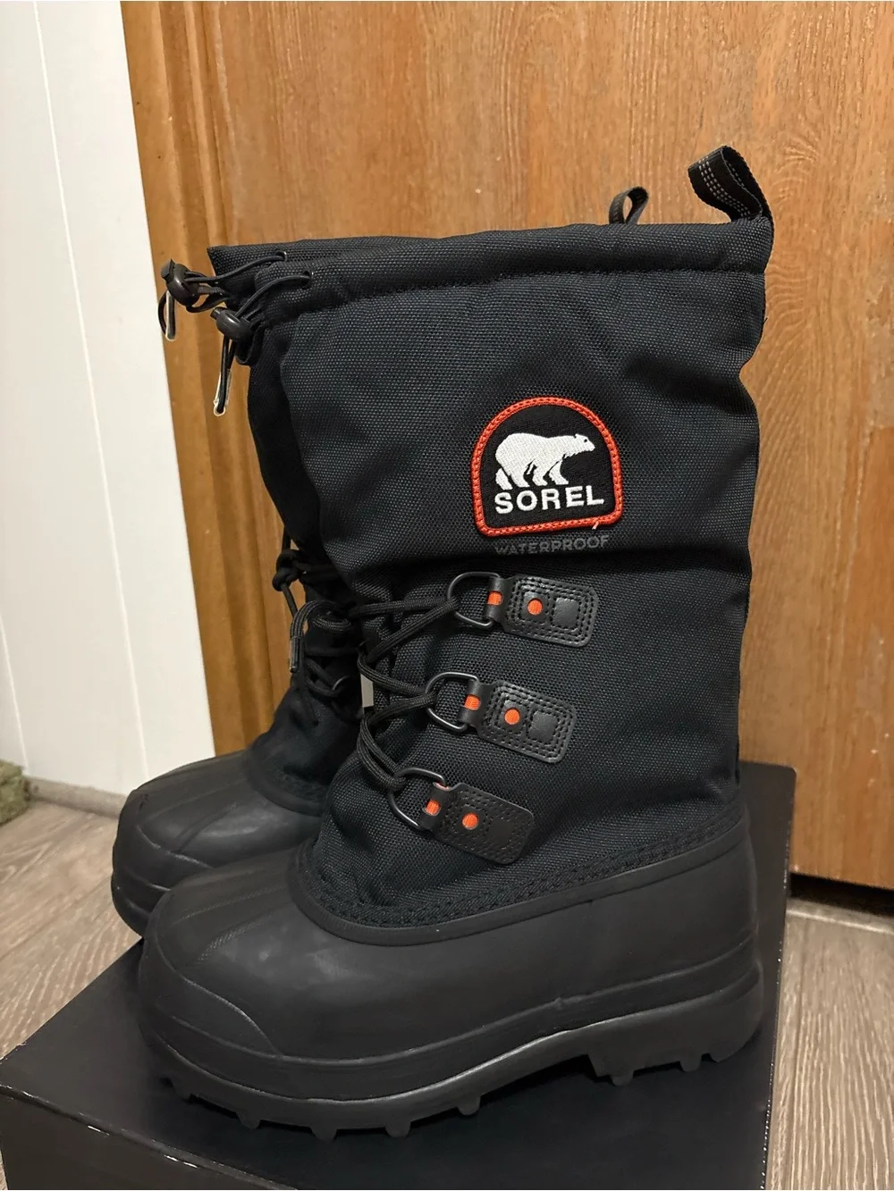 Sorel Men's Black Tall Waterproof Snow Boots with Red Accents